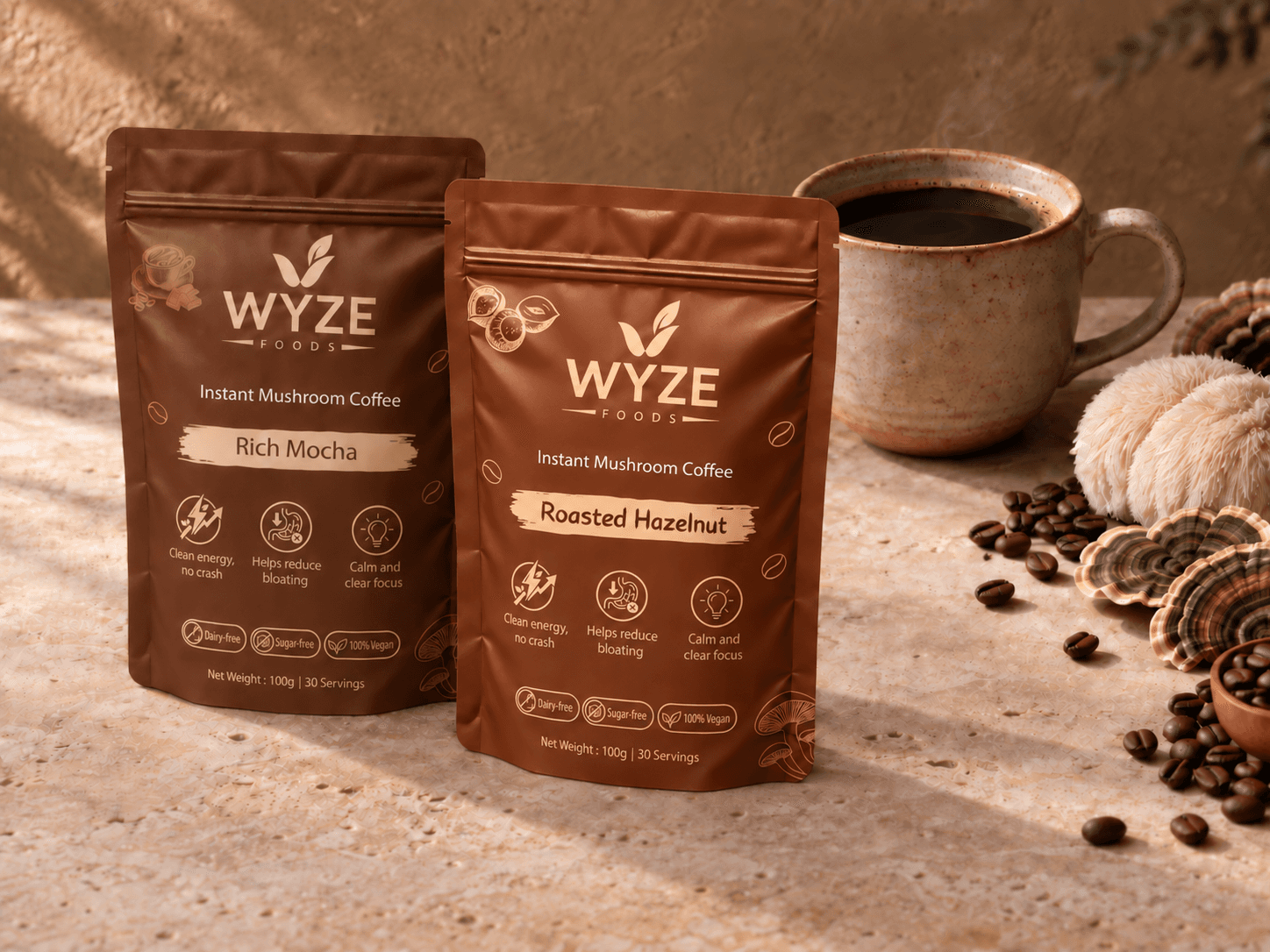 WYZE Rich Mocha and Roasted Hazelnut pouches beside a fresh coffee